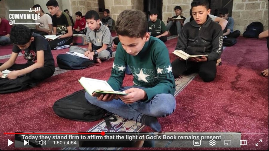Video still: boys reading in a mosque in Gaza
